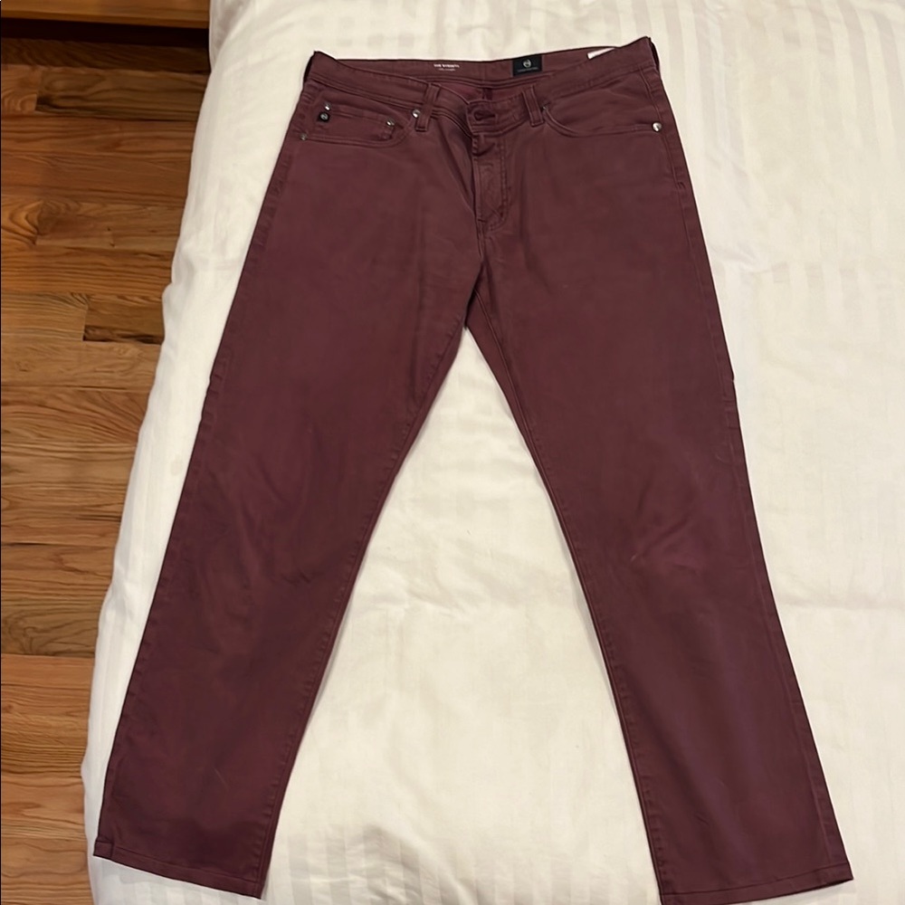 AG Jeans men’s burgundy stretch pants.